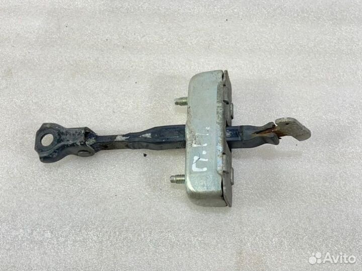 Ограничитель двери передний правый Toyota Corolla