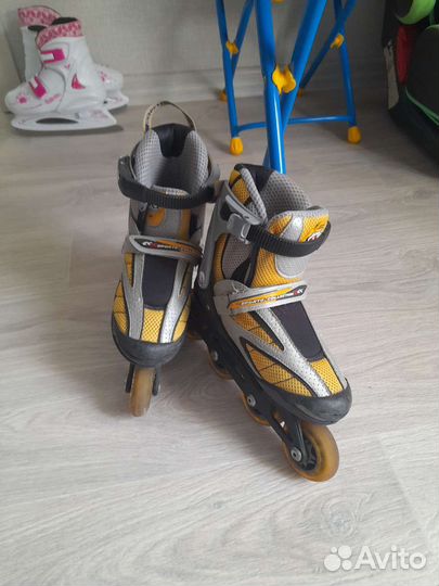 Роликовые коньки