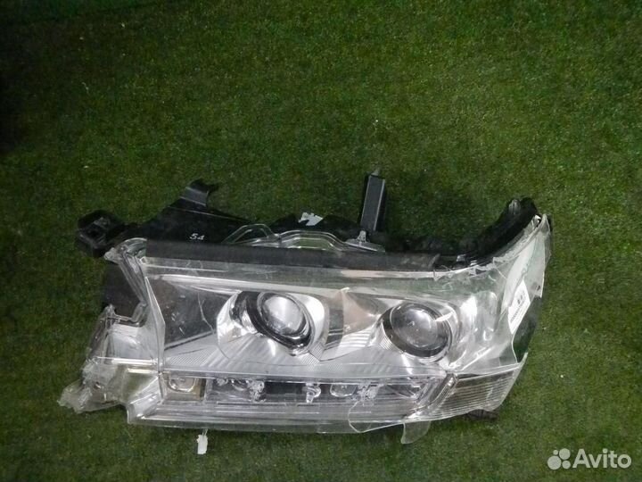 Фара левая Toyota Land Cruiser