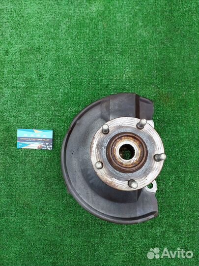 Кулак поворотный левый Mitsubishi Lancer X