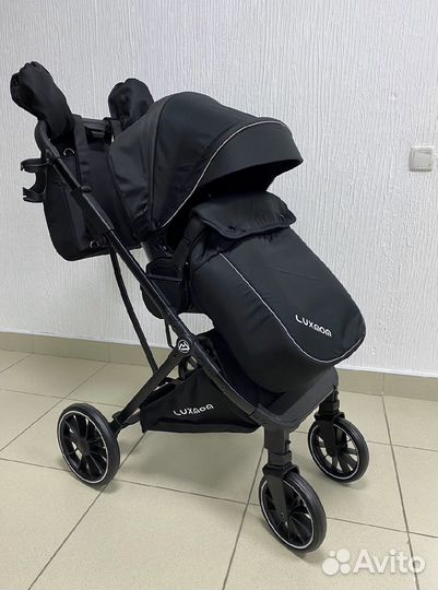 Прогулочная коляска с реверсивным блоком