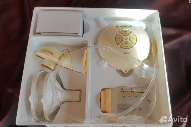 Молокоотсос medela электрический