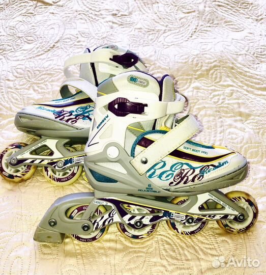 Роликовые коньки