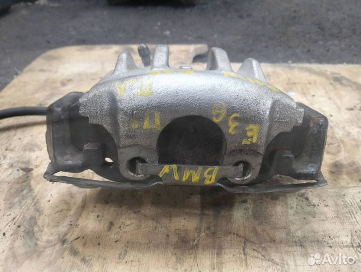 Суппорт тормозной передний левый BMW 3 E36