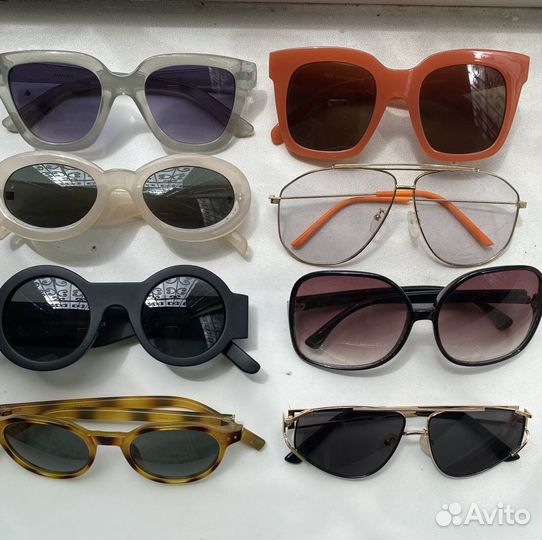 Солнцезащитные очки много