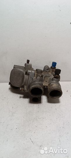 Корпус термостата BMW e34 m30b30
