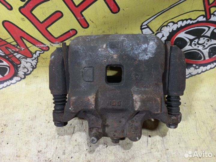 Суппорт тормозной передний левый Nissan Teana J31