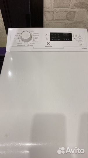 Стиральная машина с вертикальной загрузкой