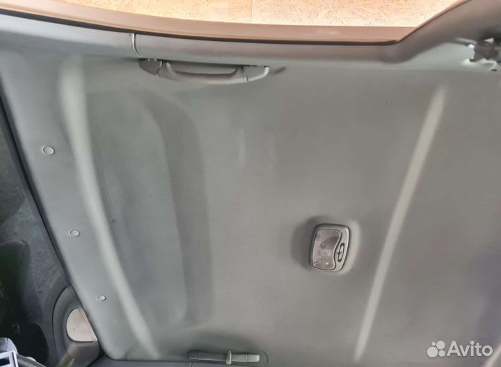 Обшивка потолка (потолок) Kia Spectra