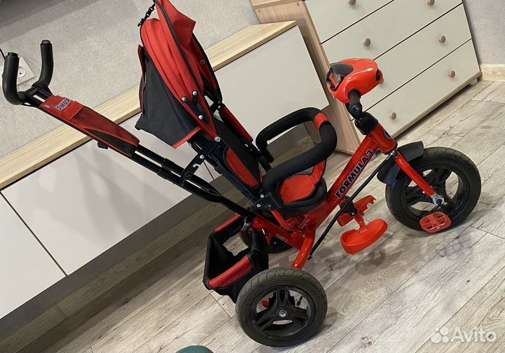 Трехколесный велосипед с ручкой