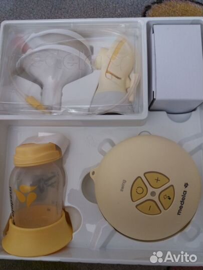 Молокоотсос medela электрический новый