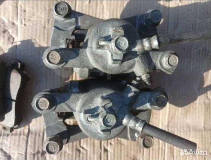 Сппорта тормозные передние пара Move La150S