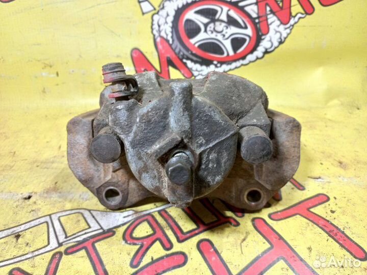 Суппорт тормозной передний левый Opel Astra H GTC