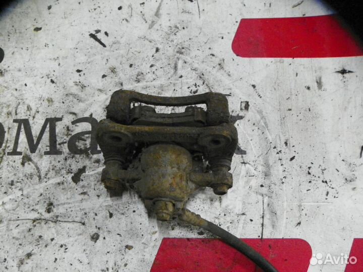 Суппорт тормозной задний левый Kia Ceed