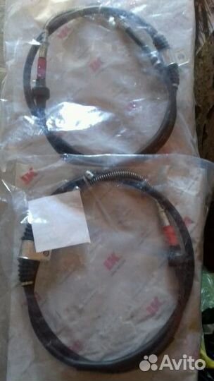 Трос стояночного тормоза на Мицубиси ланцер 10