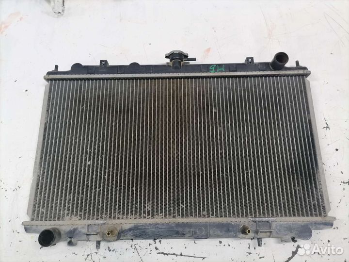 Радиатор охлаждения двигателя Nissan Bluebird 14
