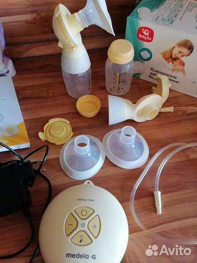 Молокоотсос medela swing электрический