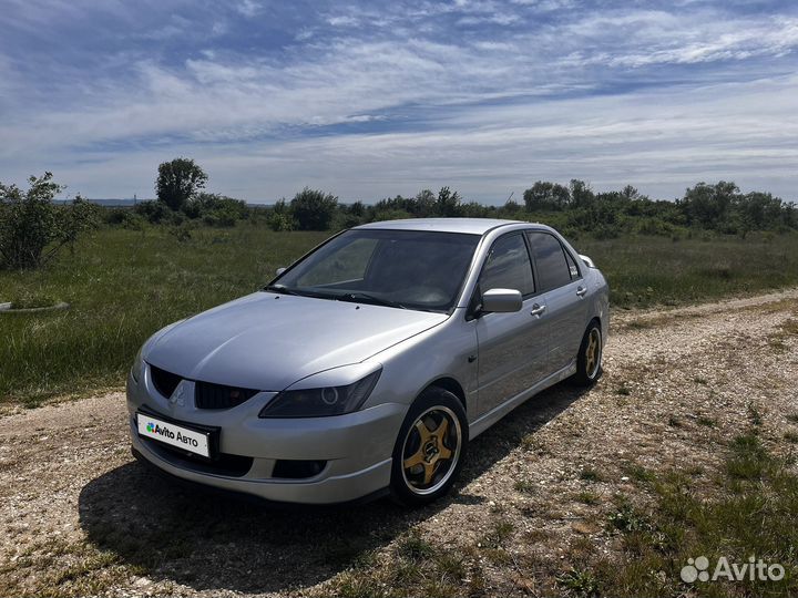 Mitsubishi Lancer 2.0 МТ, 2004, 233 000 км
