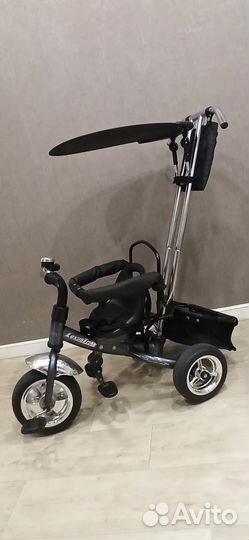 Трехколесный велосипед с ручкой