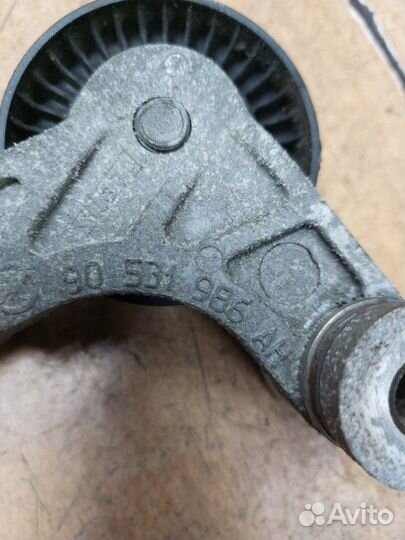 Натяжной ролик приводного ремня Opel Corsa B X10XE