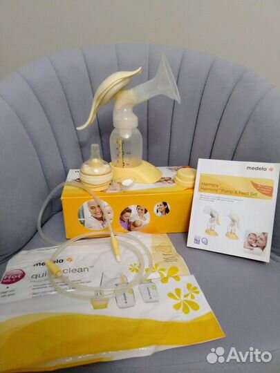 Молокоотсос Medela ручной +соска Calm