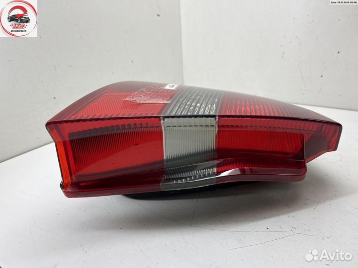 Фонарь задний левый б/у Mitsubishi Carisma