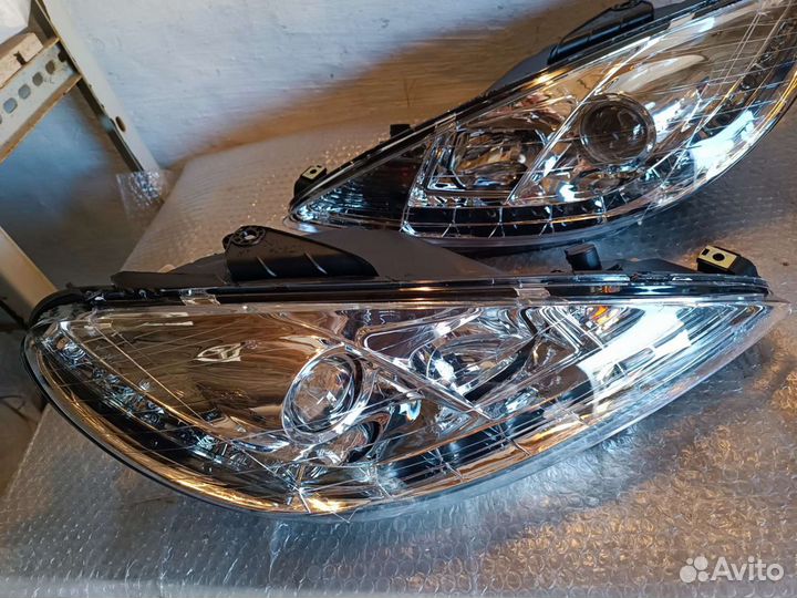Фары Peugeot 206