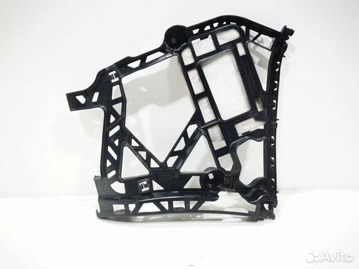 Кронштейн крепления бампера переднего правый