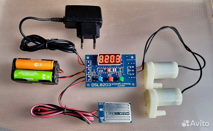 Система полива цветов с режимом досветки
