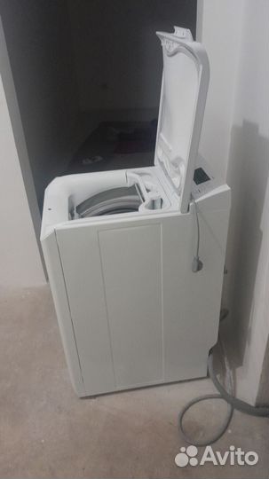 Стиральная машина с вертикальной загрузкой