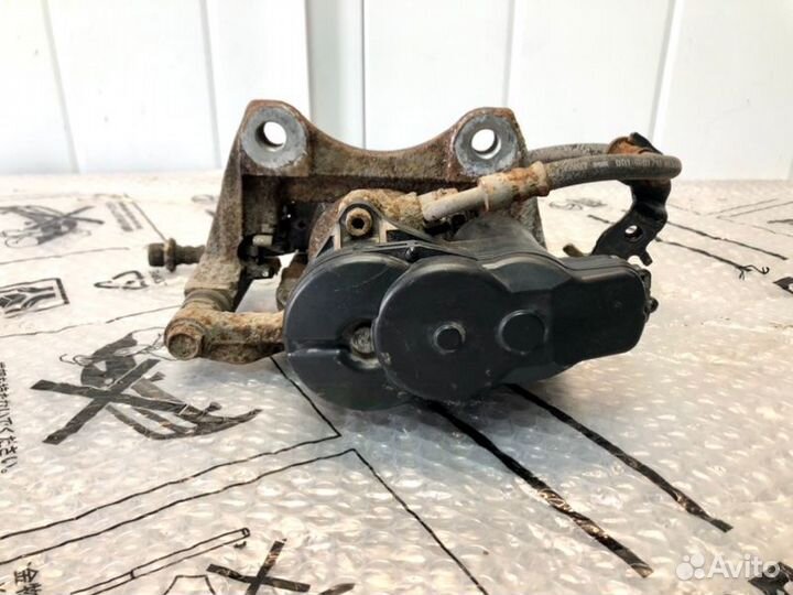 Суппорт тормозной задний левый Lexus Rx 4