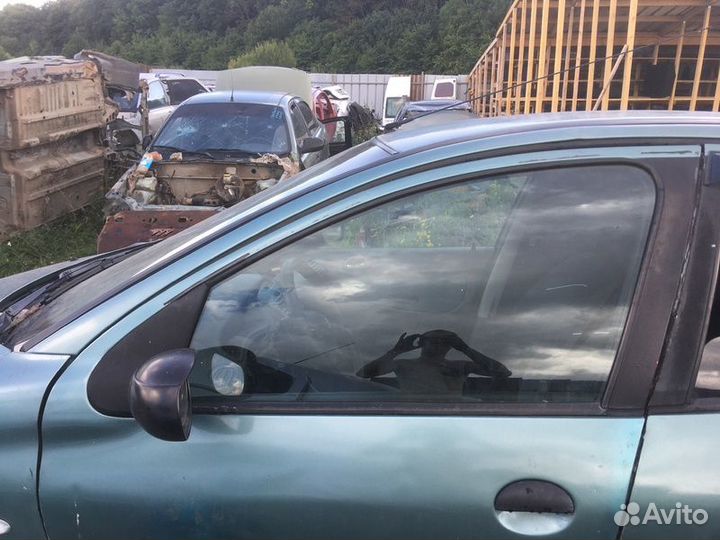 Дверь передняя левая Peugeot 206