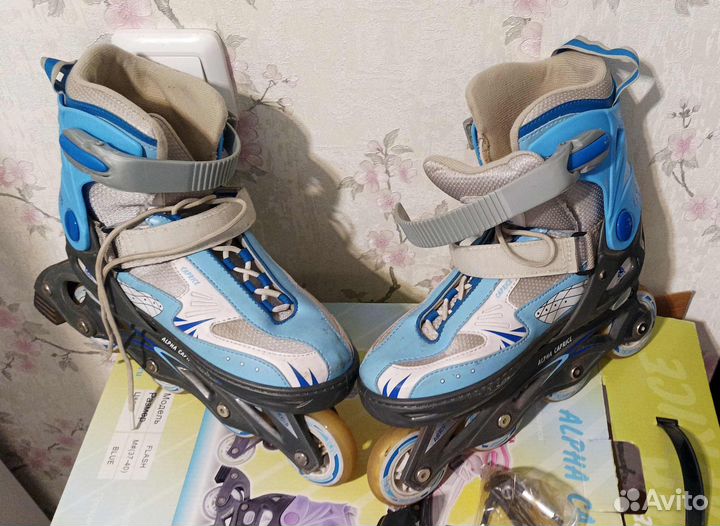 Роликовые коньки