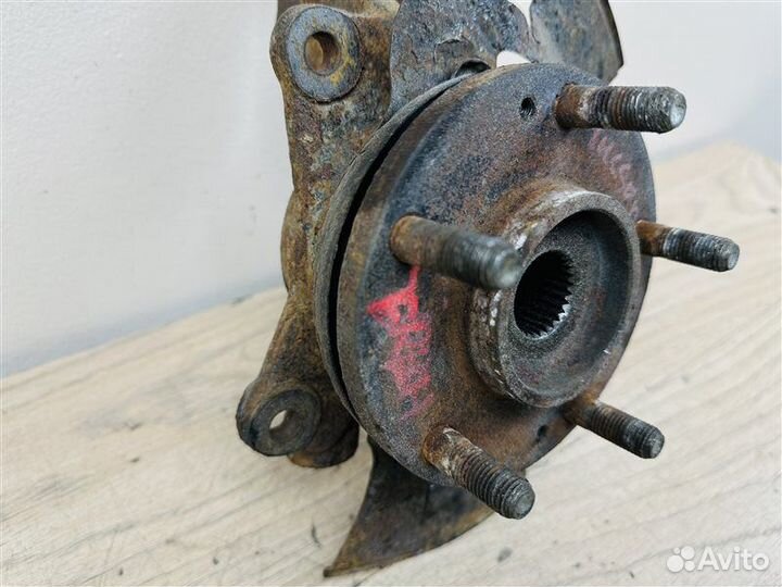 Кулак поворотный передний левый Hyundai Tucson 1