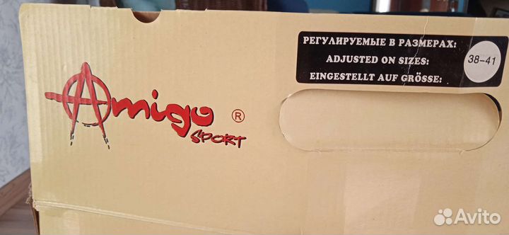 Роликовые коньки