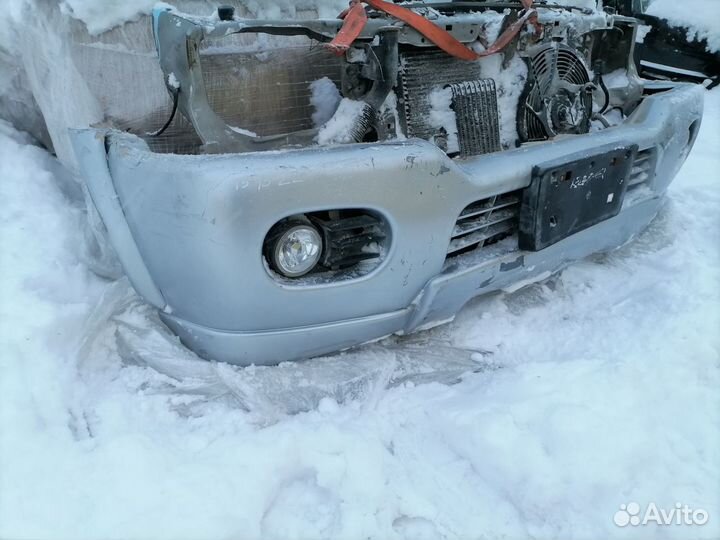 Бампер передний Mitsubishi Pajero Sport K90