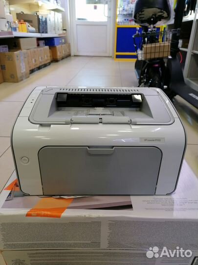 Принтер HP P1102
