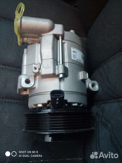 Компрессор кондиционера aveo t300