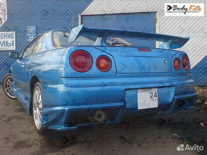 Задний бампер Bomex для Nissan Skyline R34 98-01