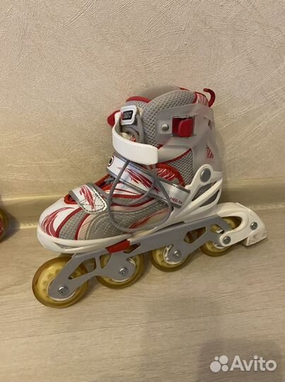 Роликовые коньки