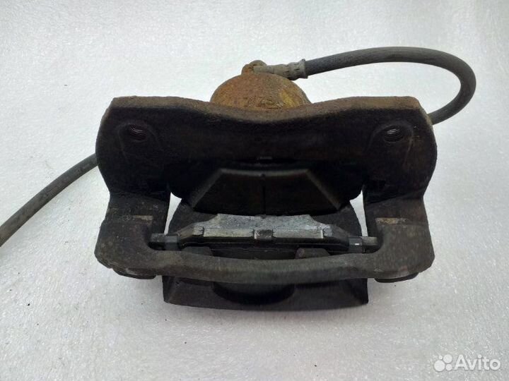 Суппорт тормозной передний правый Toyota Rav4 XA40