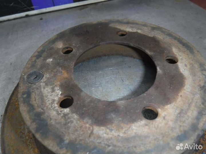 Диск тормозной задний левый Mitsubishi Lancer 10