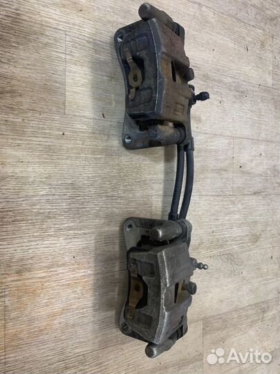 Суппорта и диски задняя Mitsubishi Lancer 10 CY3A