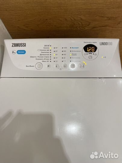 Стиральная машина с вертикальной загрузкой