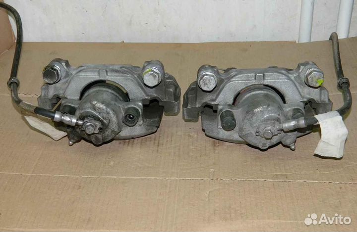 Суппорт передний левый/правый VW Touran