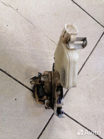 Замок дверной задний левый Nissan Almera Classic