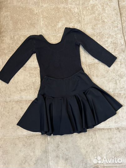 Гимнастический купальник и юбки