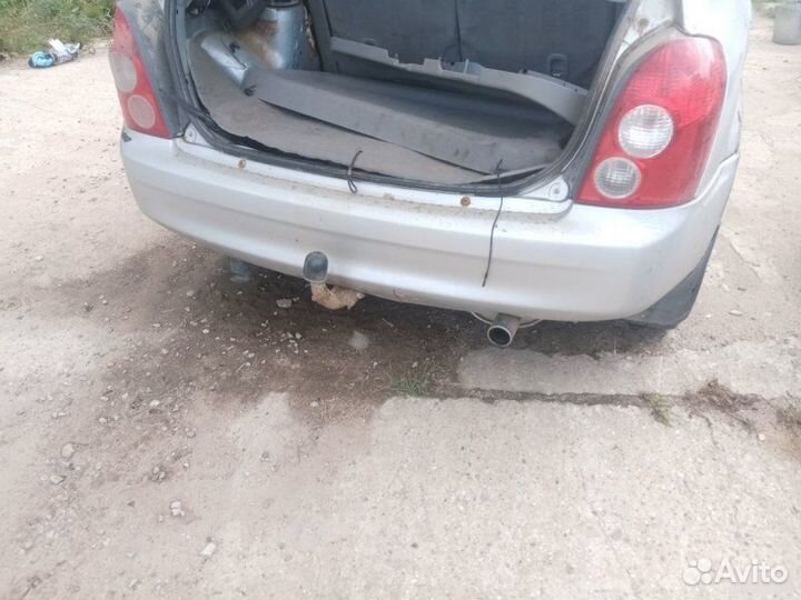 Бампер задний Mazda 323 BJ