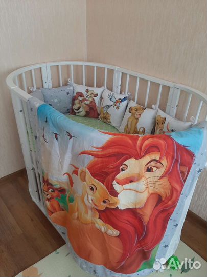 Детская кроватка с поперечным маятником