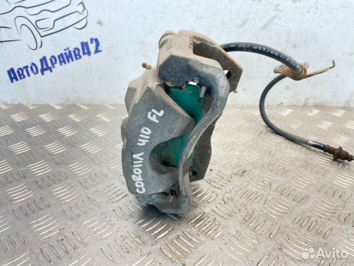 Суппорт тормозной передний левый Toyota Corolla